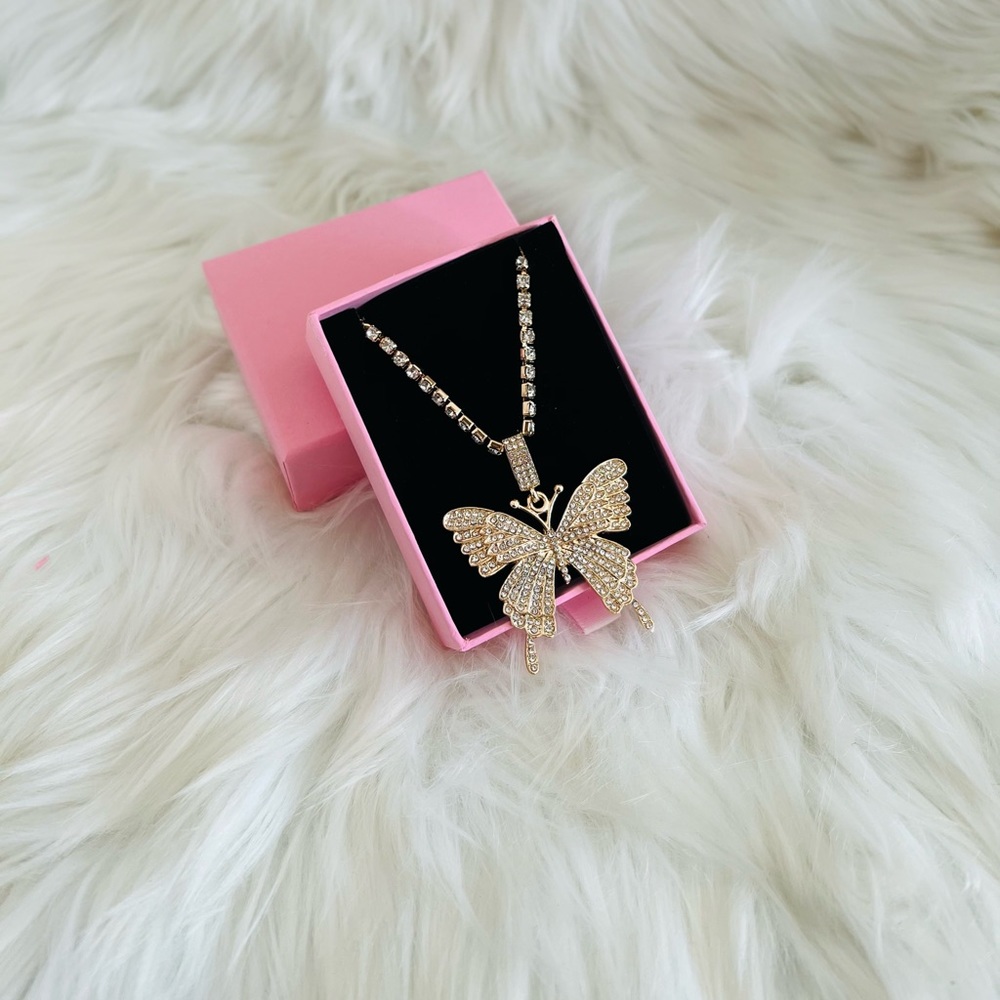 Gold flutter tennis necklace